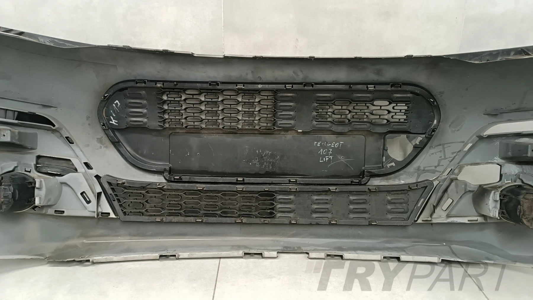 Front bumper Peugeot 107 II Lift 12-14 / + fog lights