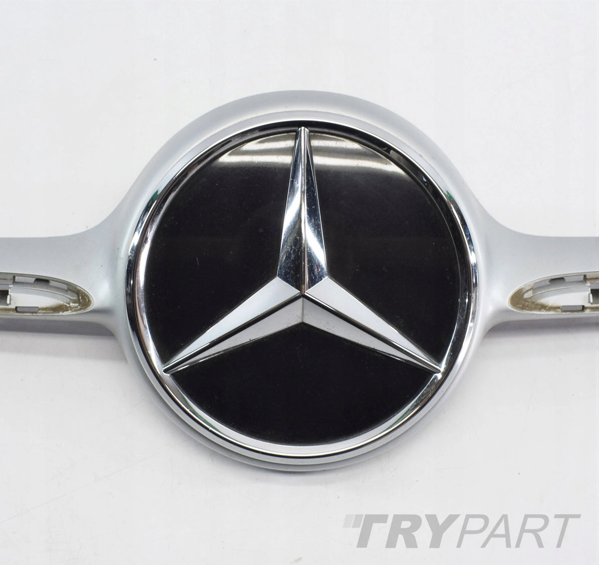 A CLASS W117 RADIATOR GRILLE EMBLEM CHROME BUMPER